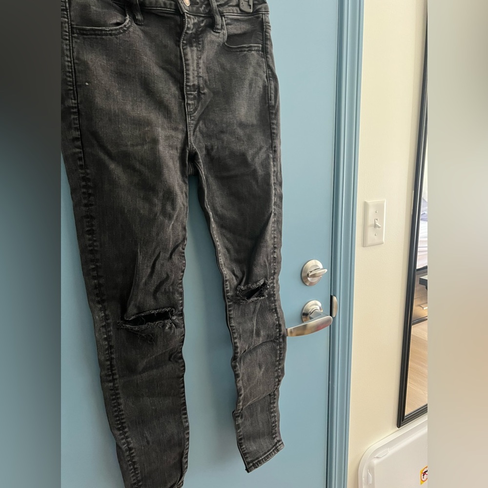 AE knee destroyed Jean. Size 8. *wrinkled bc folded up*